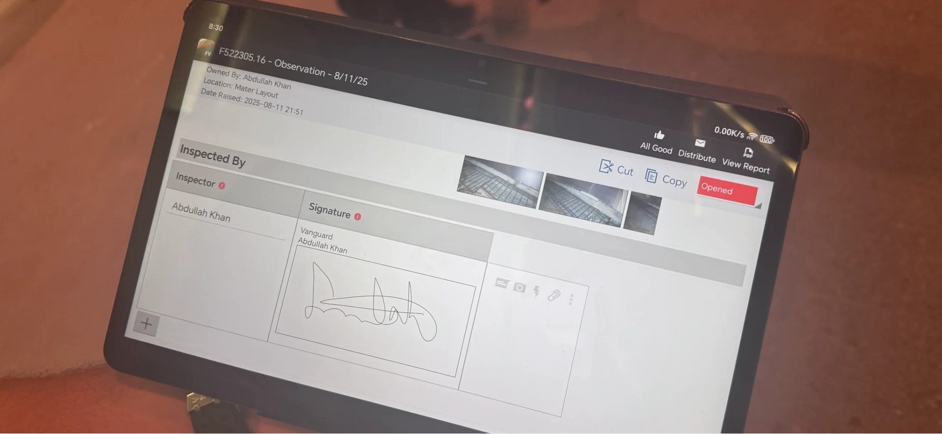 Close-up of a tablet displaying a Viewpoint Field View inspection report