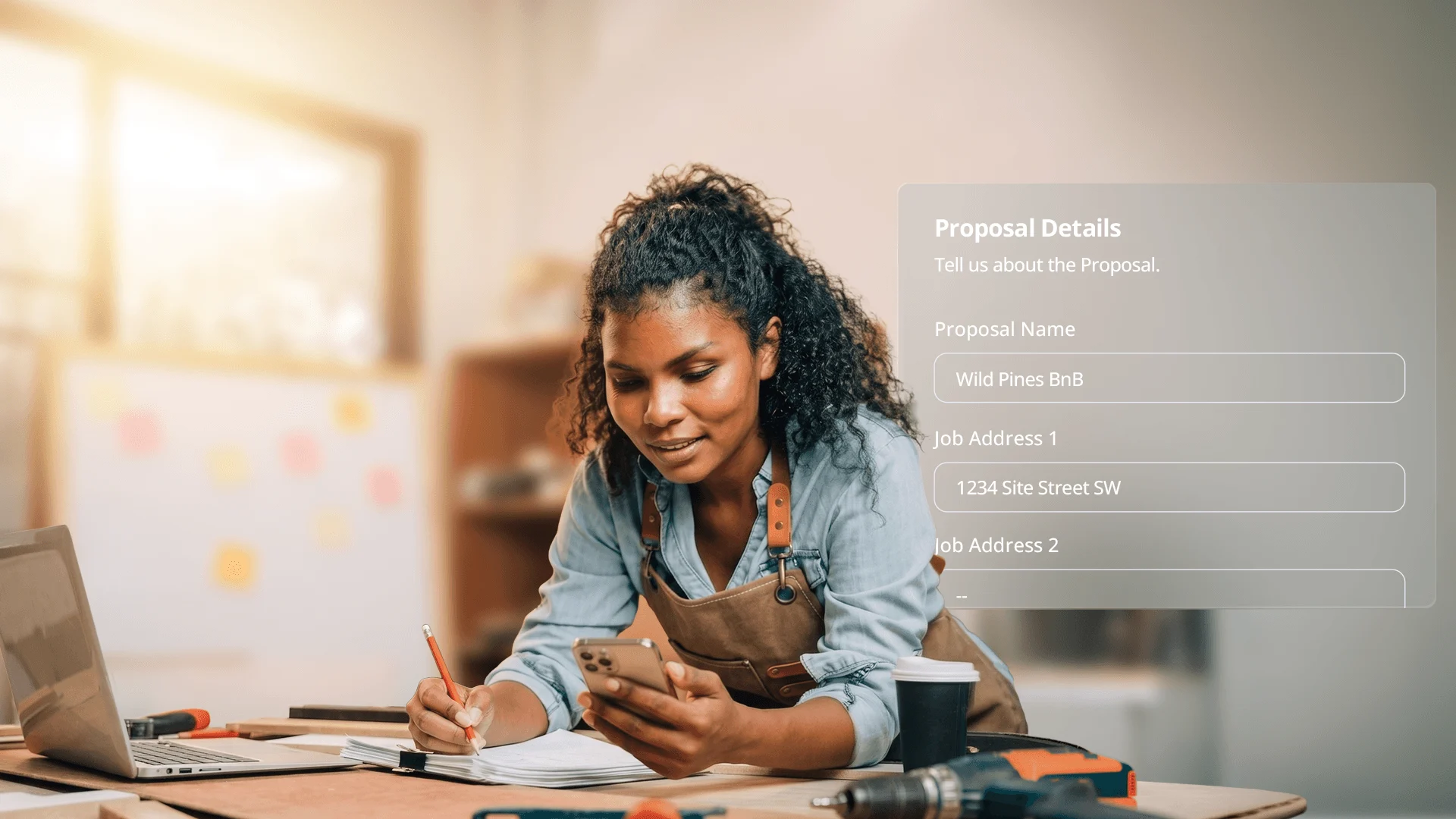 A female contractor writes in a notebook while checking her phone, next to a digital proposal overlay.