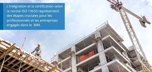 Construction site with a crane and a building under construction, with a worker on scaffolding.