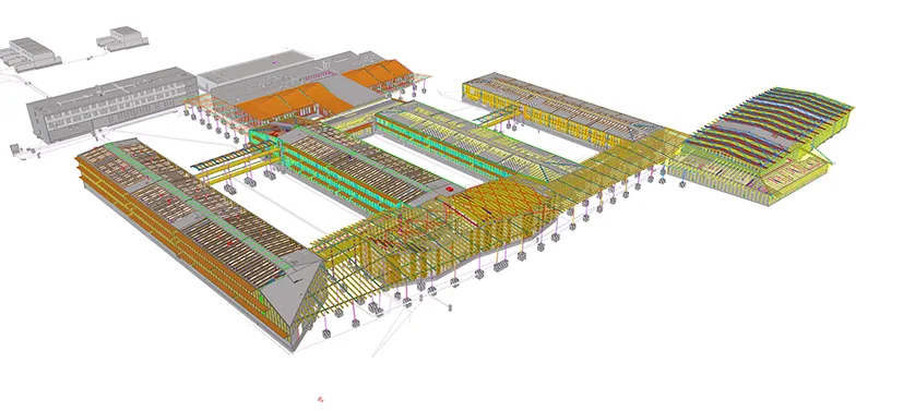 3D rendering of a school building complex with visible structural elements and utility systems.