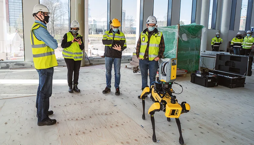 Spot the robot equipped with Trimble X7 scanner visiting the construction site of Trimble's Espoo office