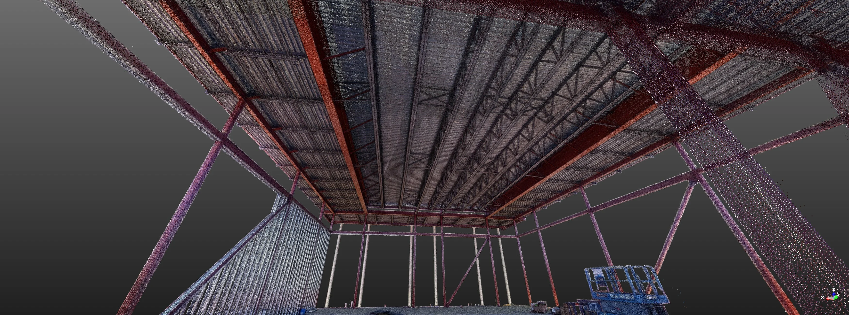 3D scan of a steel building structure under construction, showing beams, supports, and roofing.