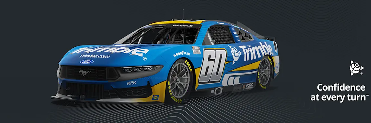 Side-angle view of Trimble car wrap with the logo and tagline "Confidence at every turn