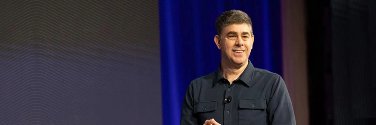 Mark Schwartz, Trimble SVP, introduces Trimble AI at the Dimensions User Conference, showcasing productivity and efficiency in AEC workflows.
