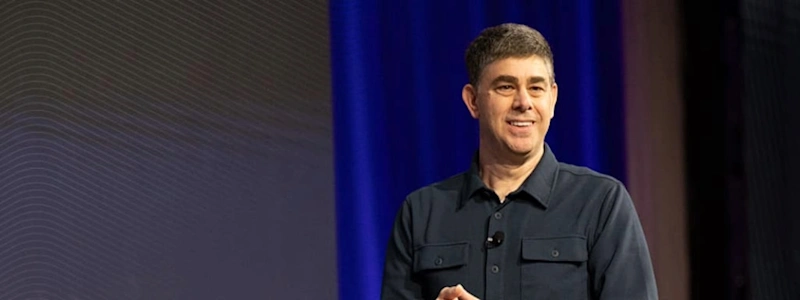 Mark Schwartz, Trimble SVP, introduces Trimble AI at the Dimensions User Conference, showcasing productivity and efficiency in AEC workflows.