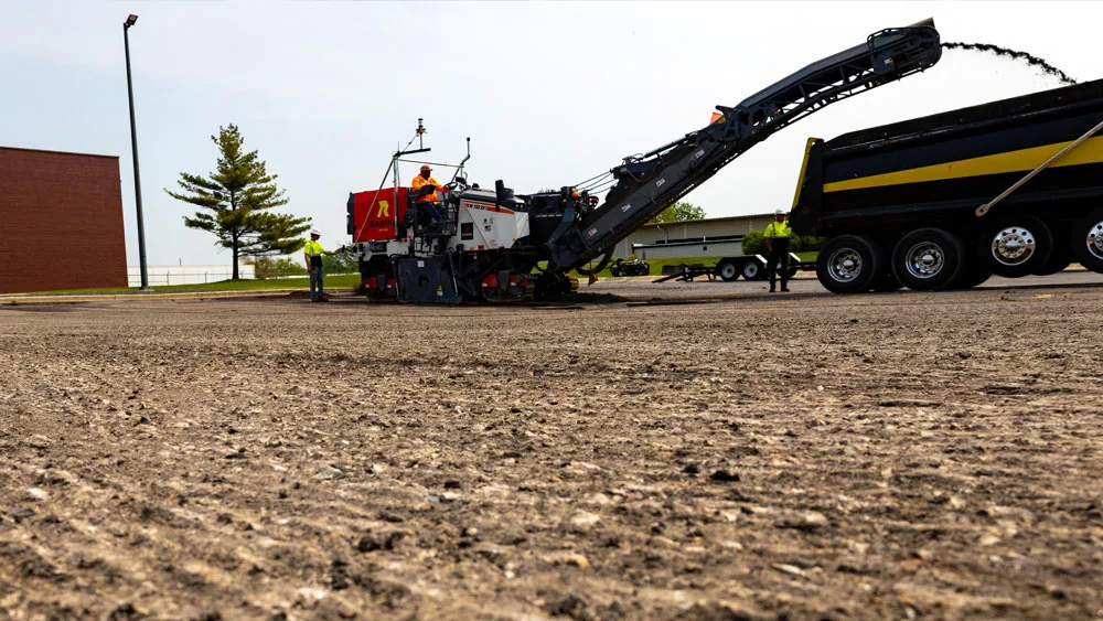 Milled surface with machines in background