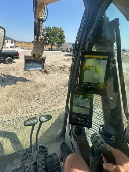 In excavator cab with machine control