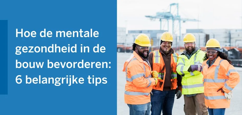Diverse group of construction workers smiling and wearing hard hats and high-visibility vests.