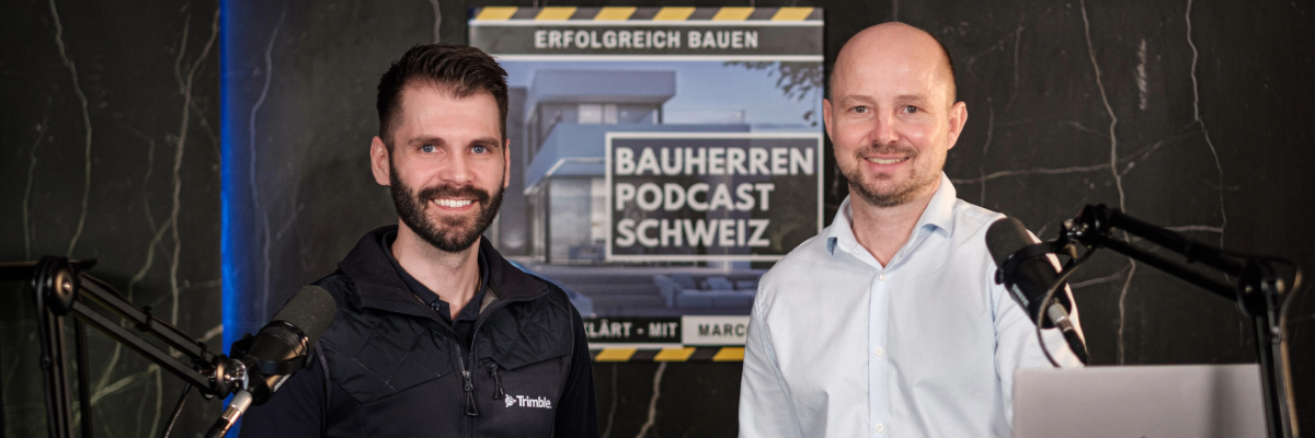 Hugo Rodrigues of Trimble and Marco Fehr Bauherren Podcast Schweiz in a podcast studio with microphones visible on both sides.