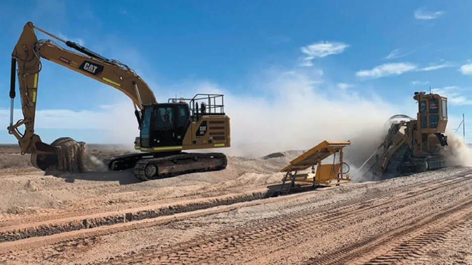 excavator and trenching machine working