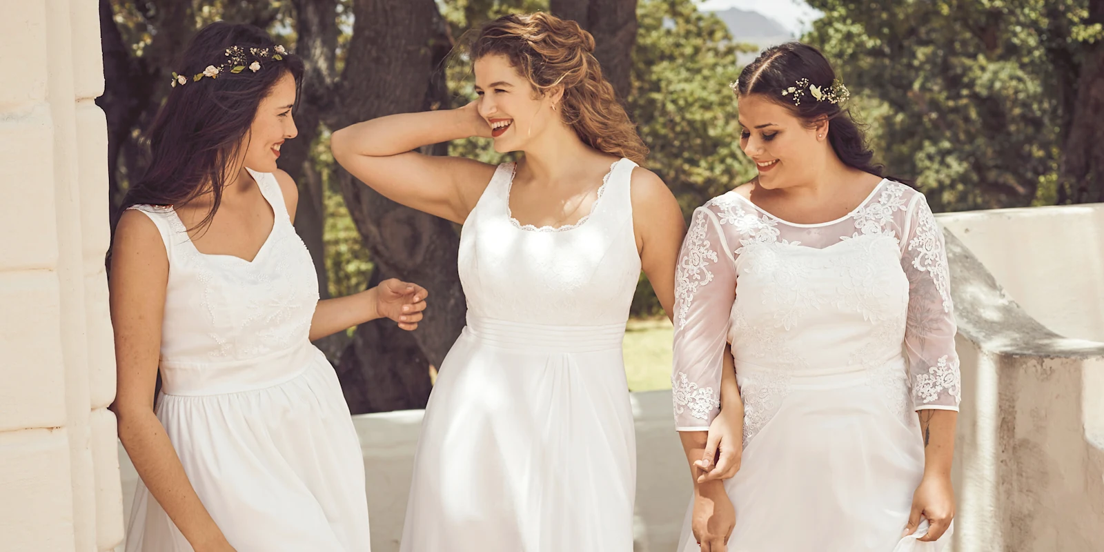 Werbebanner mit 3 Frauen im Brautkleid