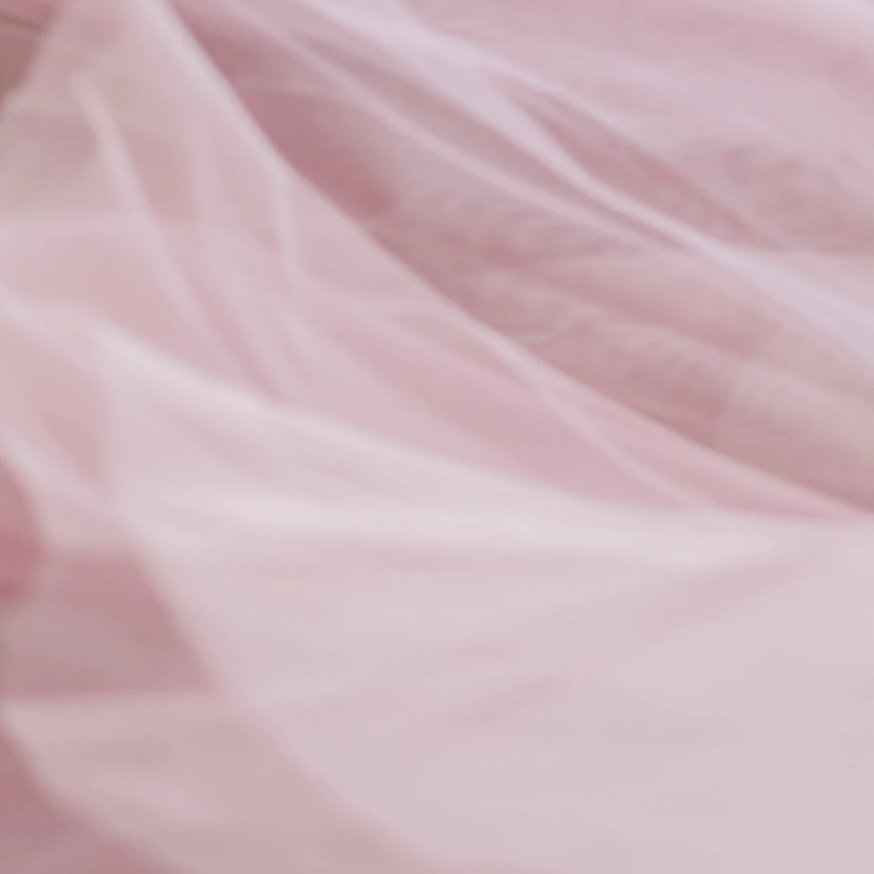 Detailaufnahme eines Stoffes aus Polyester, hier aus Chiffon Detailaufnahme eines Stoffes aus Polyester, hier aus Chiffon