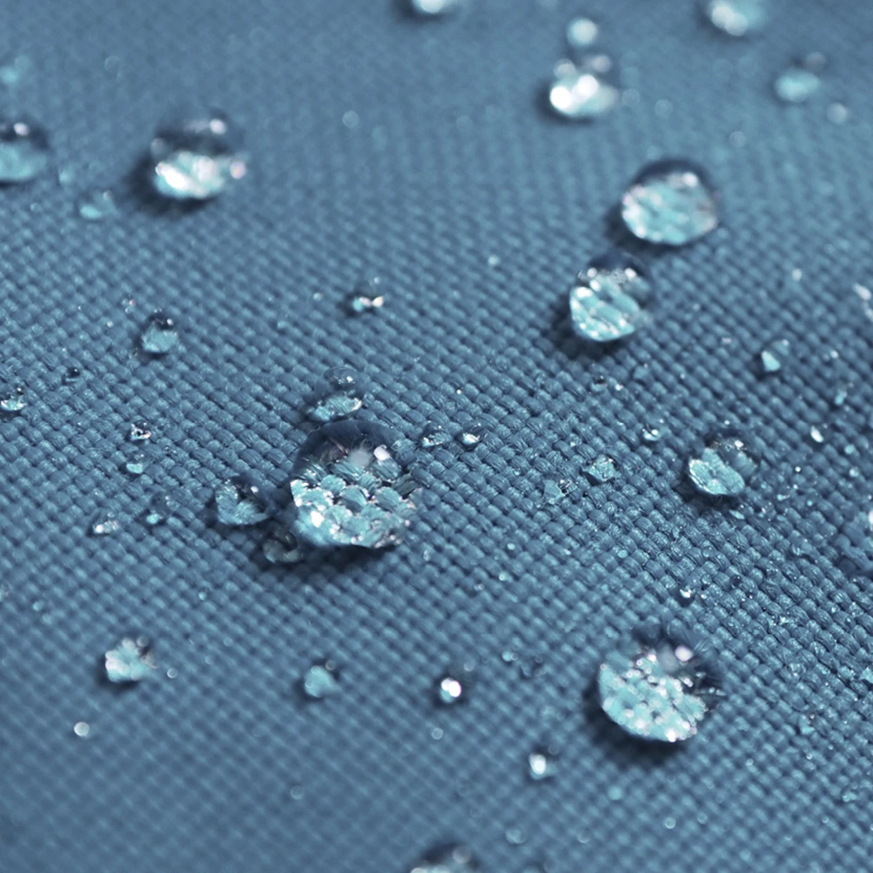 Detailaufnahme eines Stoffes aus wasserabweisendem Polyamid Detailaufnahme eines Stoffes aus wasserabweisendem Polyamid