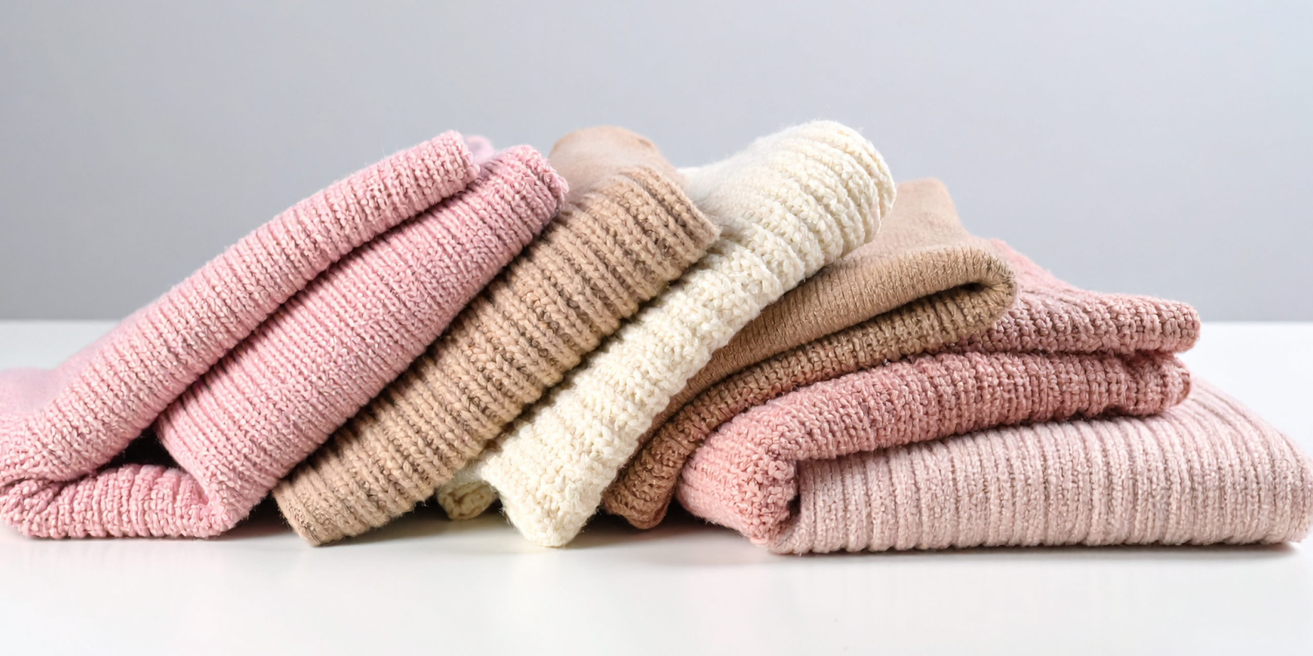 Werbebanner mit Strickpullovern und Verlinkung in die Strick-Beratung