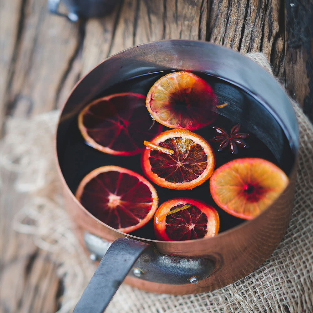 a pot of mulled wine cooking