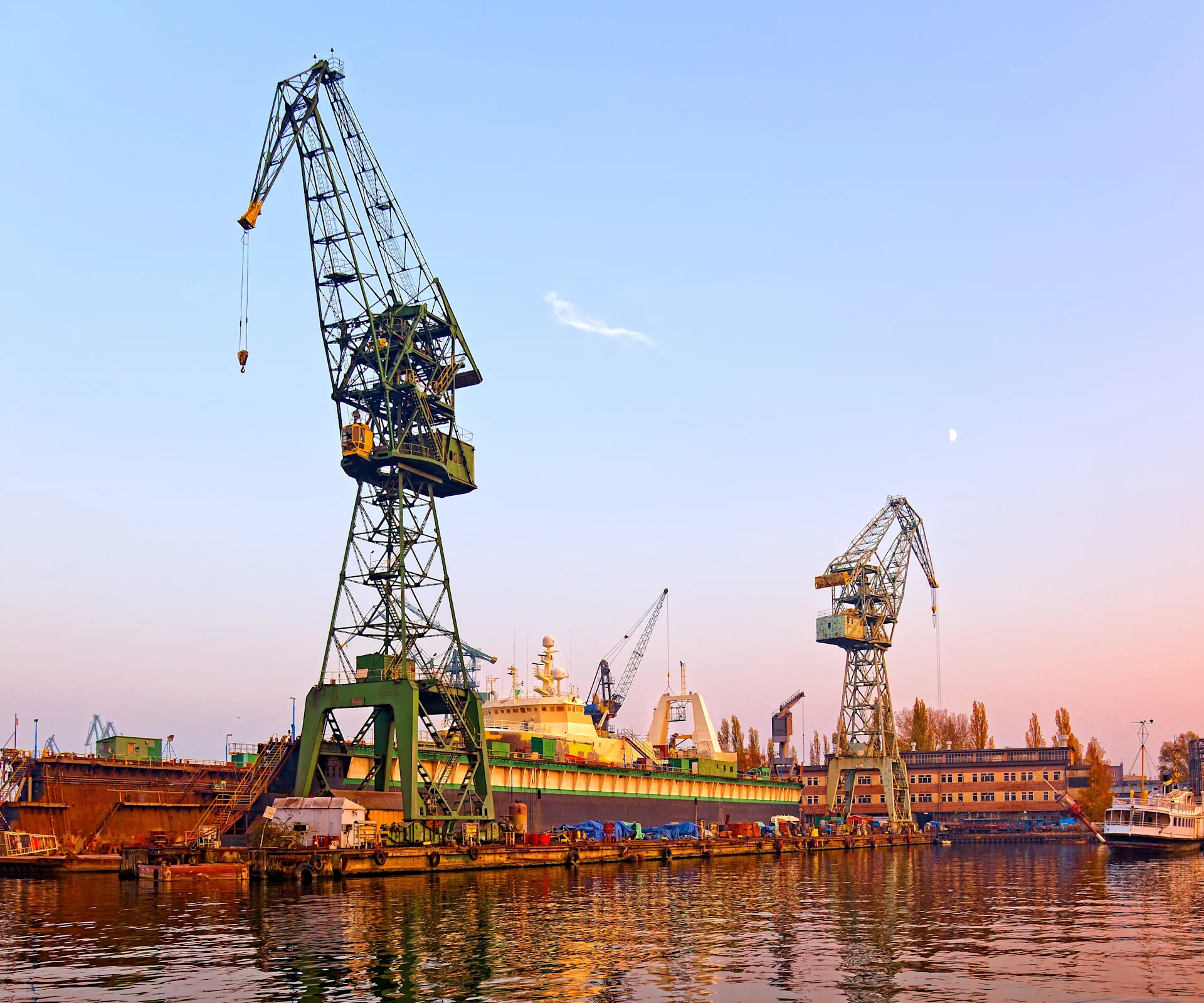 Industrial port crane in a shipyard environment