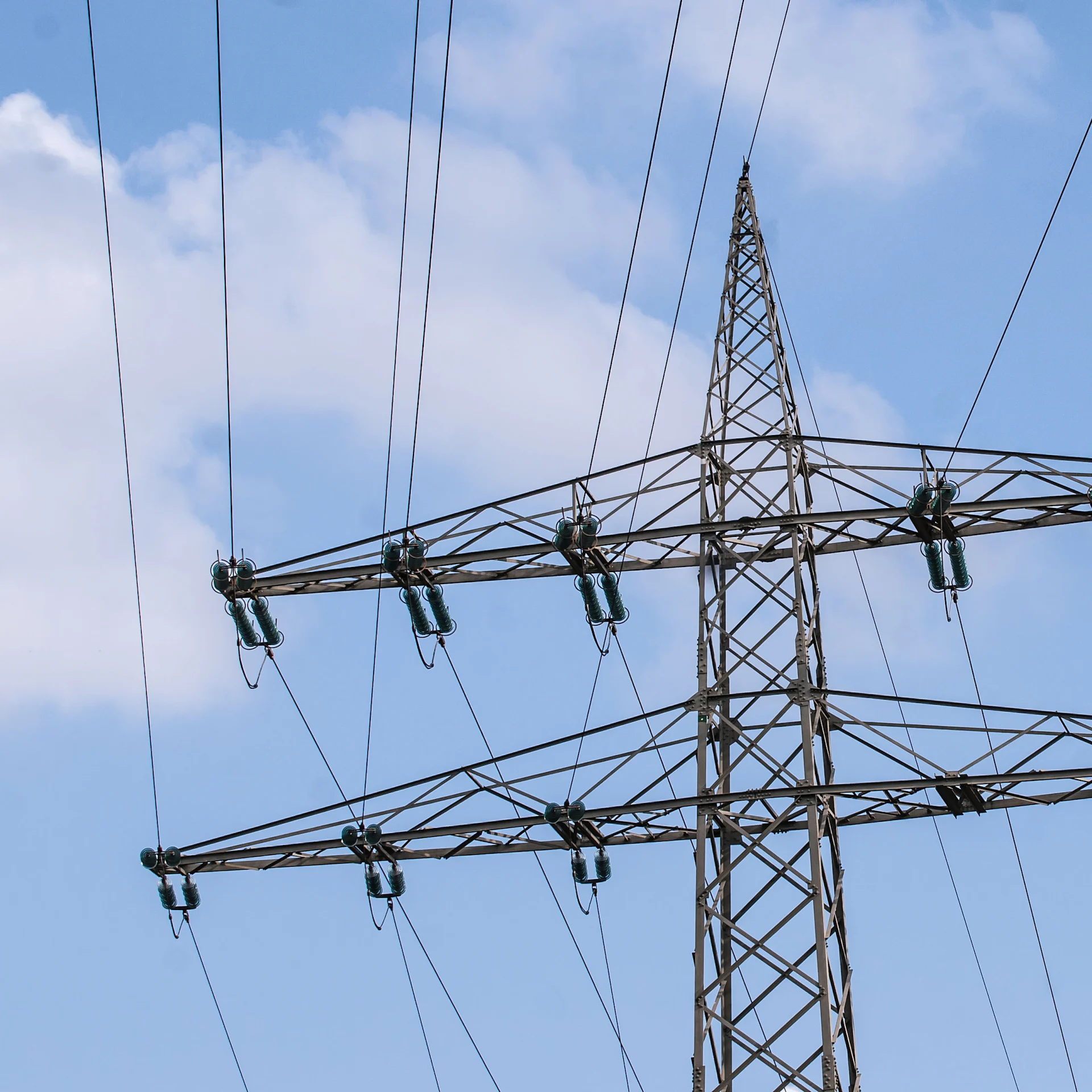An electricity transmission line and pylon (square)