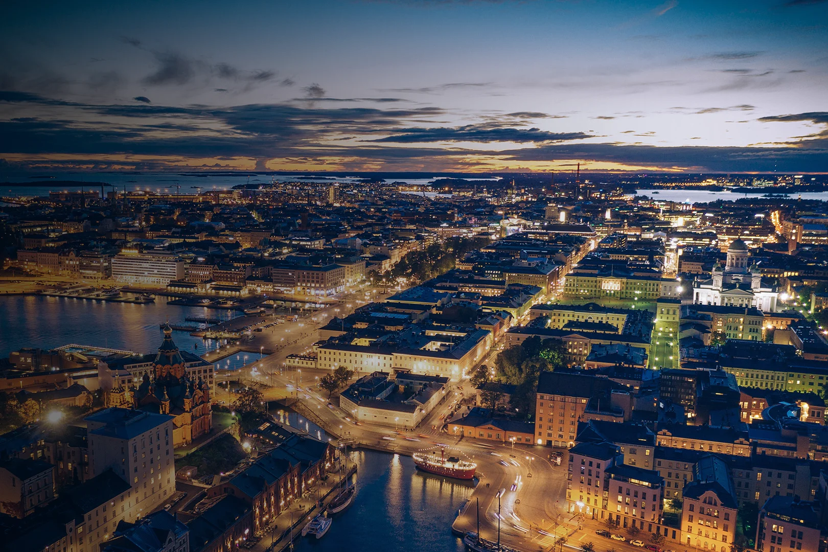The City of Helsinki photographed from the air at night. The image shows the Helsinki Cathedral, Katajanokka and the Market Square.