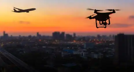 city landscape and airplane and drone