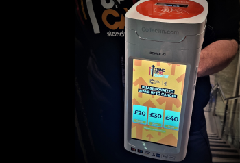 Cancer Research UK - volunteer with contactless donation device using Give A Little software