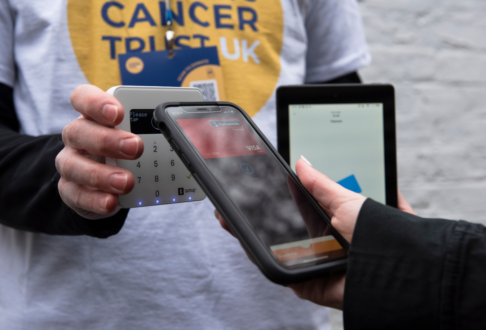 Photo of donation being made by SmartPhone