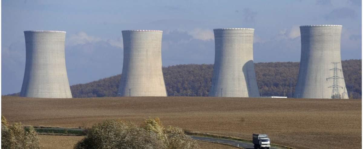 Steam cooling towers of the Mochovce nuclear power plant are seen on November 3, 2008 in southern of Slovakia between the towns of Nitra and Levice. The Slovak unit of the Italian firm Enel SpA started the construction of two new reactors at the Mochovce nuclear plant as the utility seeks to tap rising energy demand. AFP PHOTO/Samuel Kubani