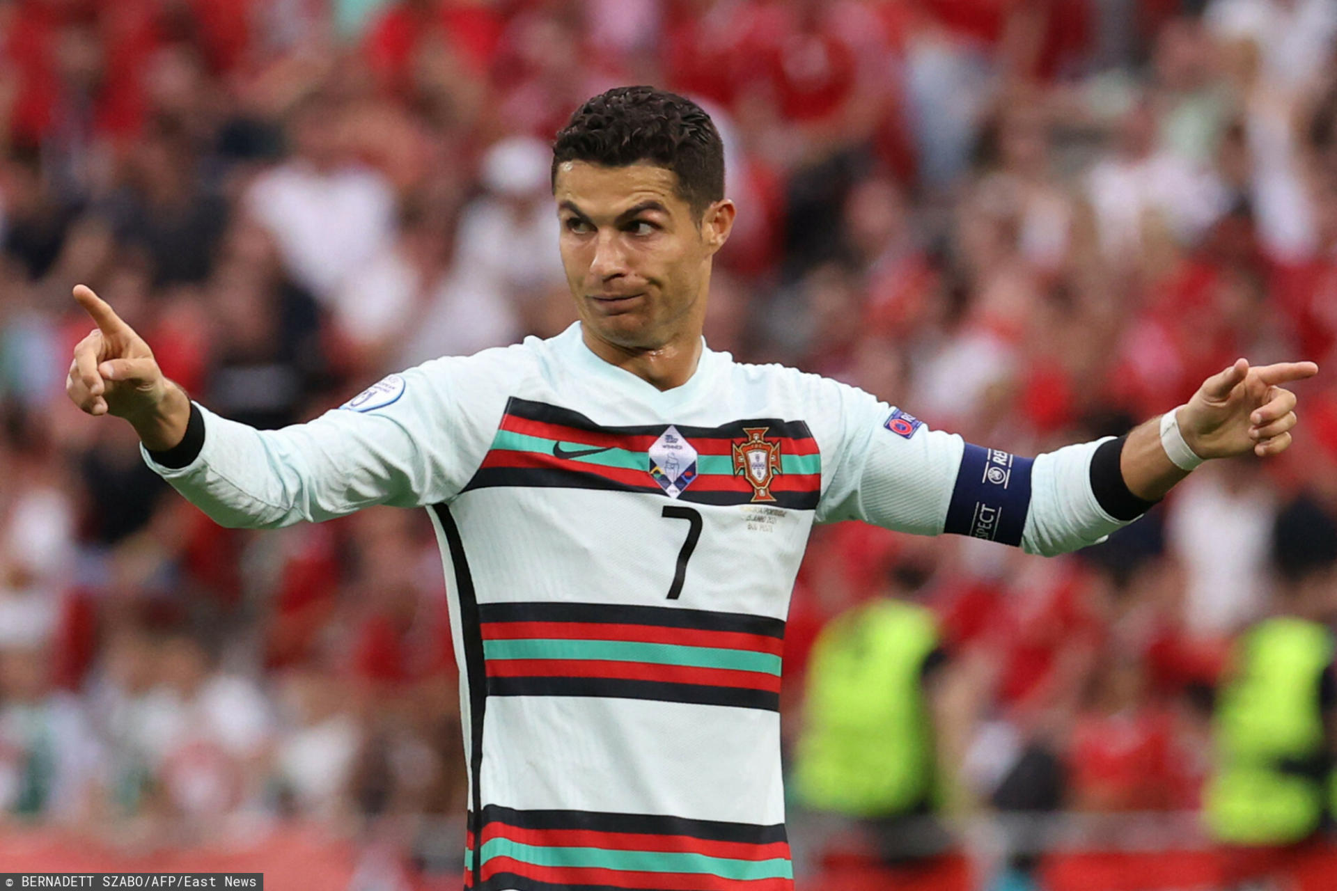 Portugal's forward Cristiano Ronaldo reacts during the UEFA EURO 2020 Group F football match between Hungary and Portugal at the Puskas Arena in Budapest on June 15, 2021. (Photo by BERNADETT SZABO / various sources / AFP)