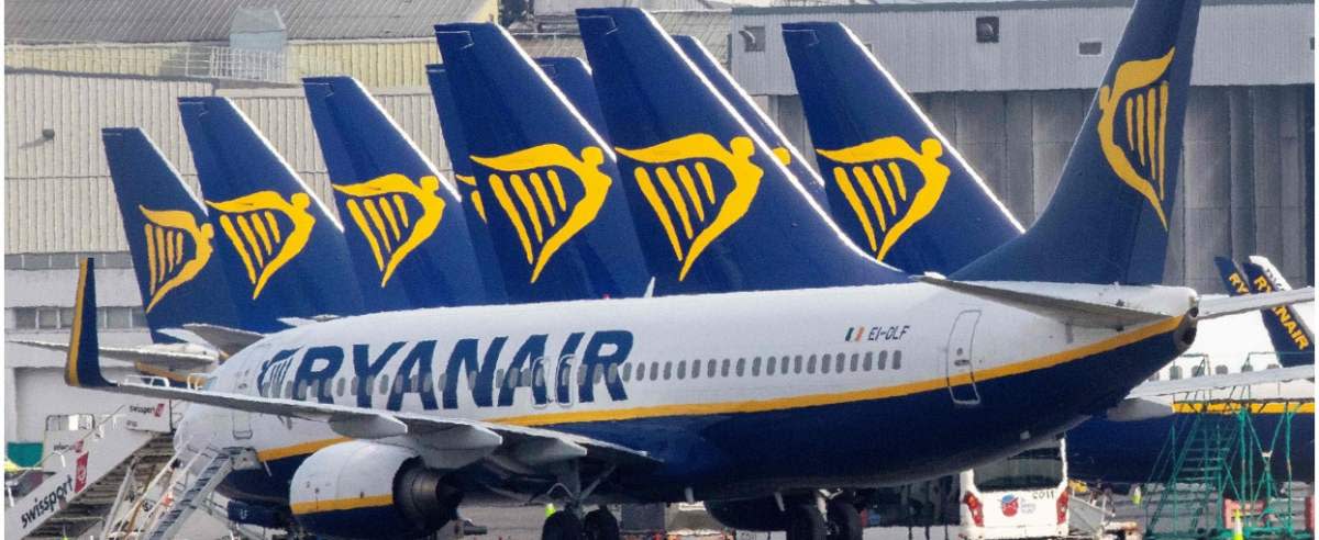 (FILES)This file photograph taken on March 23, 2020, shows Ryanair passenger aircraft on the tarmac at Dublin airport. - Irish low-cost carrier Ryanair said May 1, 2020, that it plans to axe up to 3,000 pilot and cabin crew jobs, with air transport paralysed by the coronavirus pandemic. Dublin-based Ryanair added in a statement that most of its flights will remain grounded until at least July and predicted it would take until summer 2022 before passenger demand recovers. (Photo by Paul Faith / AFP)