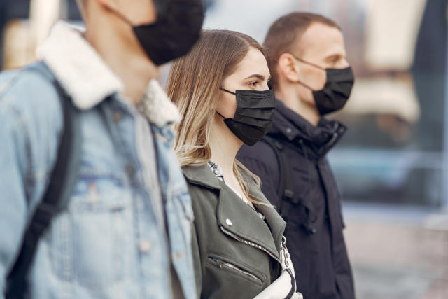 people-in-a-masks-stands-on-the-street (1)