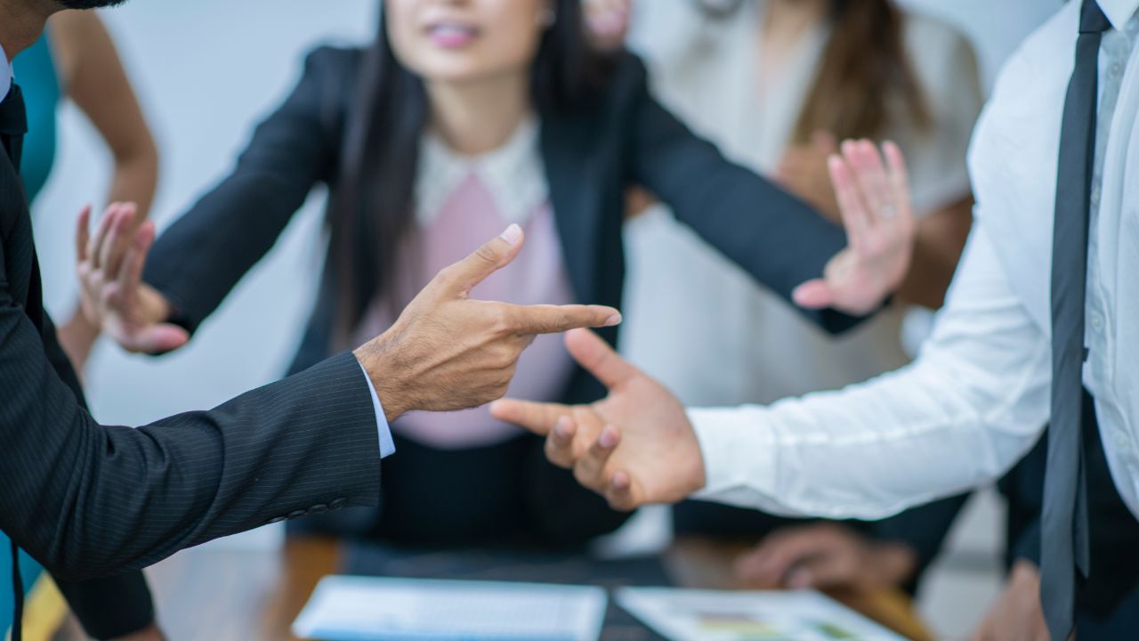 A mediator trying to break up an argument at mediation.