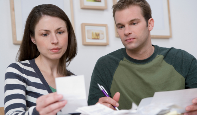 Two adult siblings review a recently deceased parent's documents as they enter the Colorado probate process.