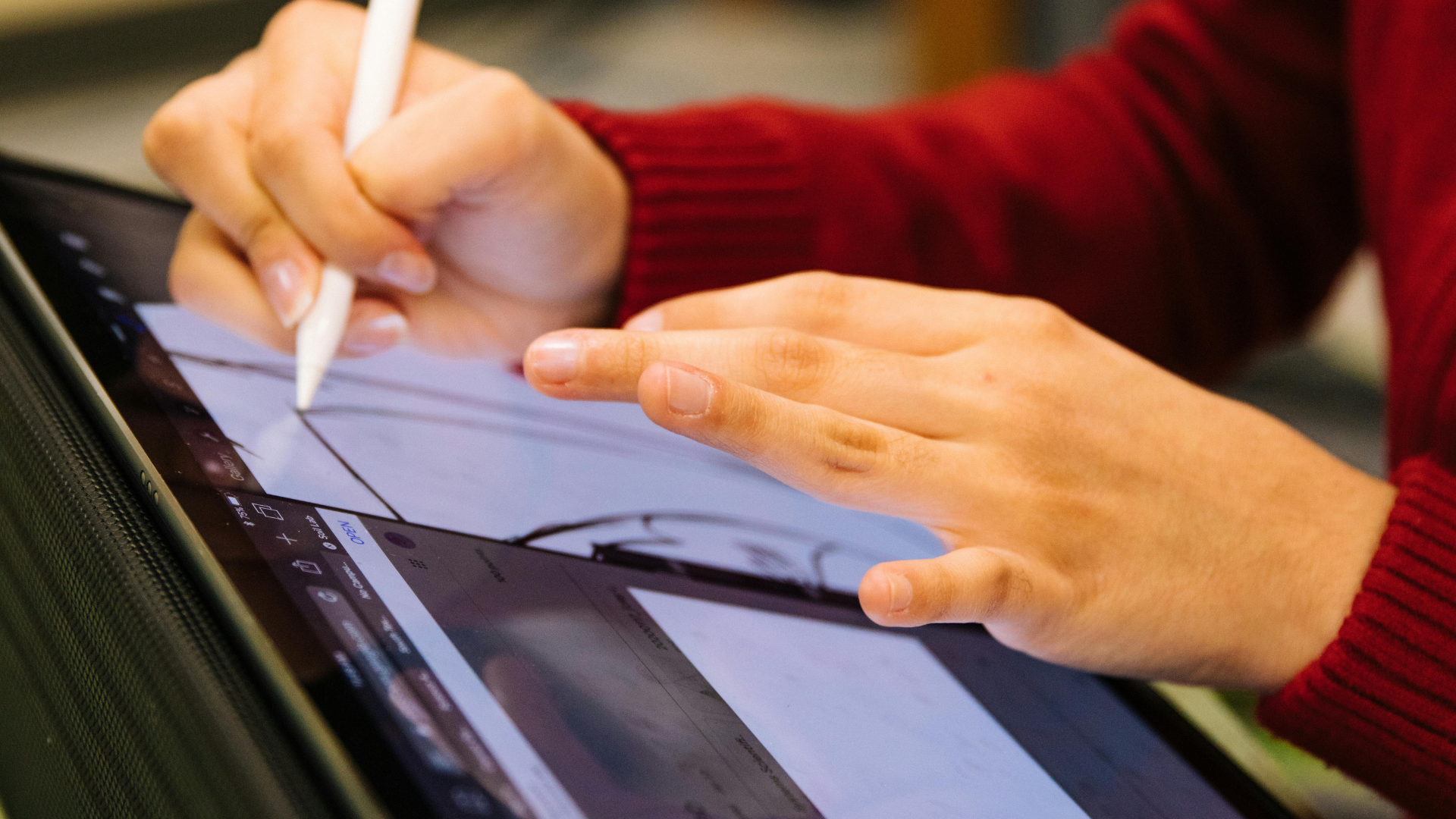 Man drawing designs protected by intellectual property laws