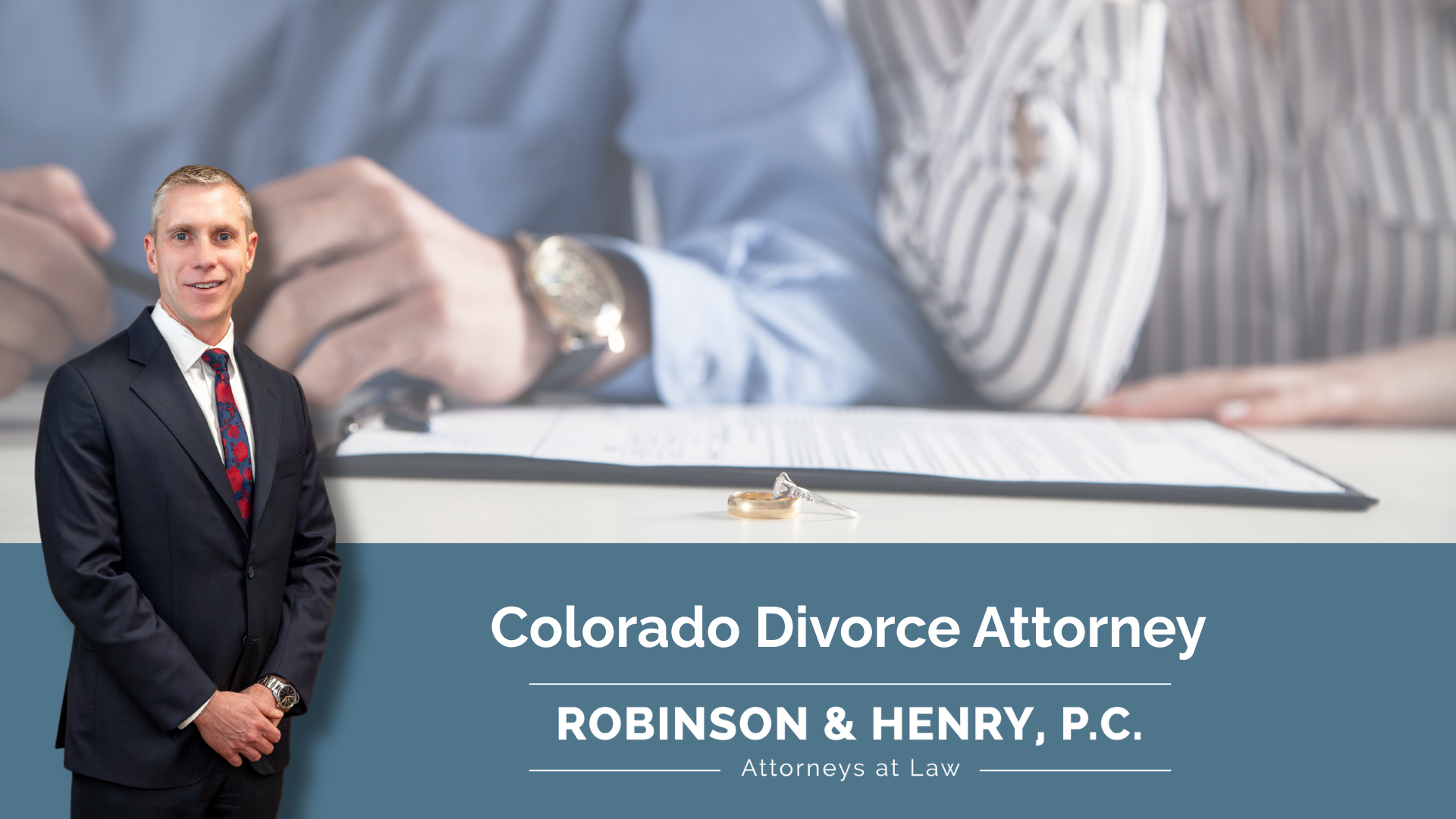 A couple in the background filing for divorce with rings in front of paperwork.