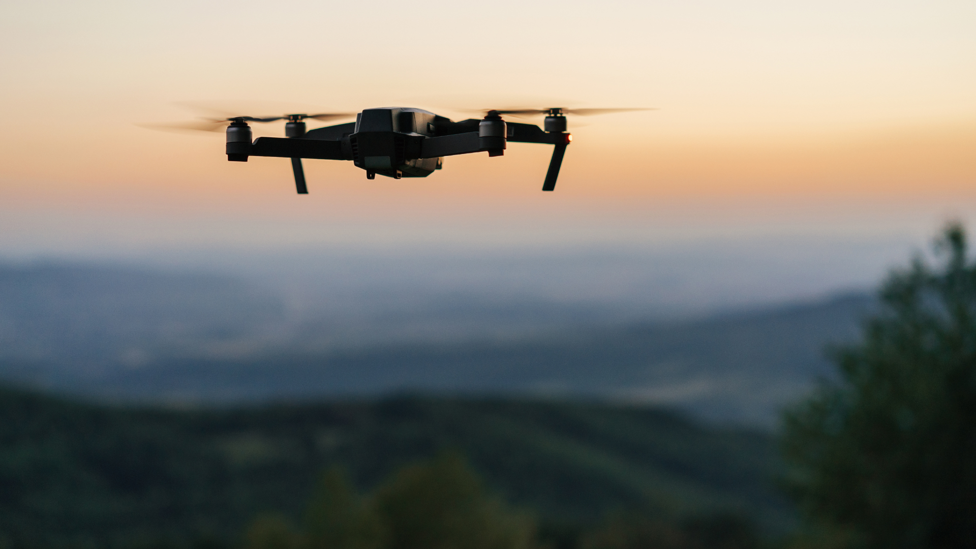 Image of a drone flying in a public space