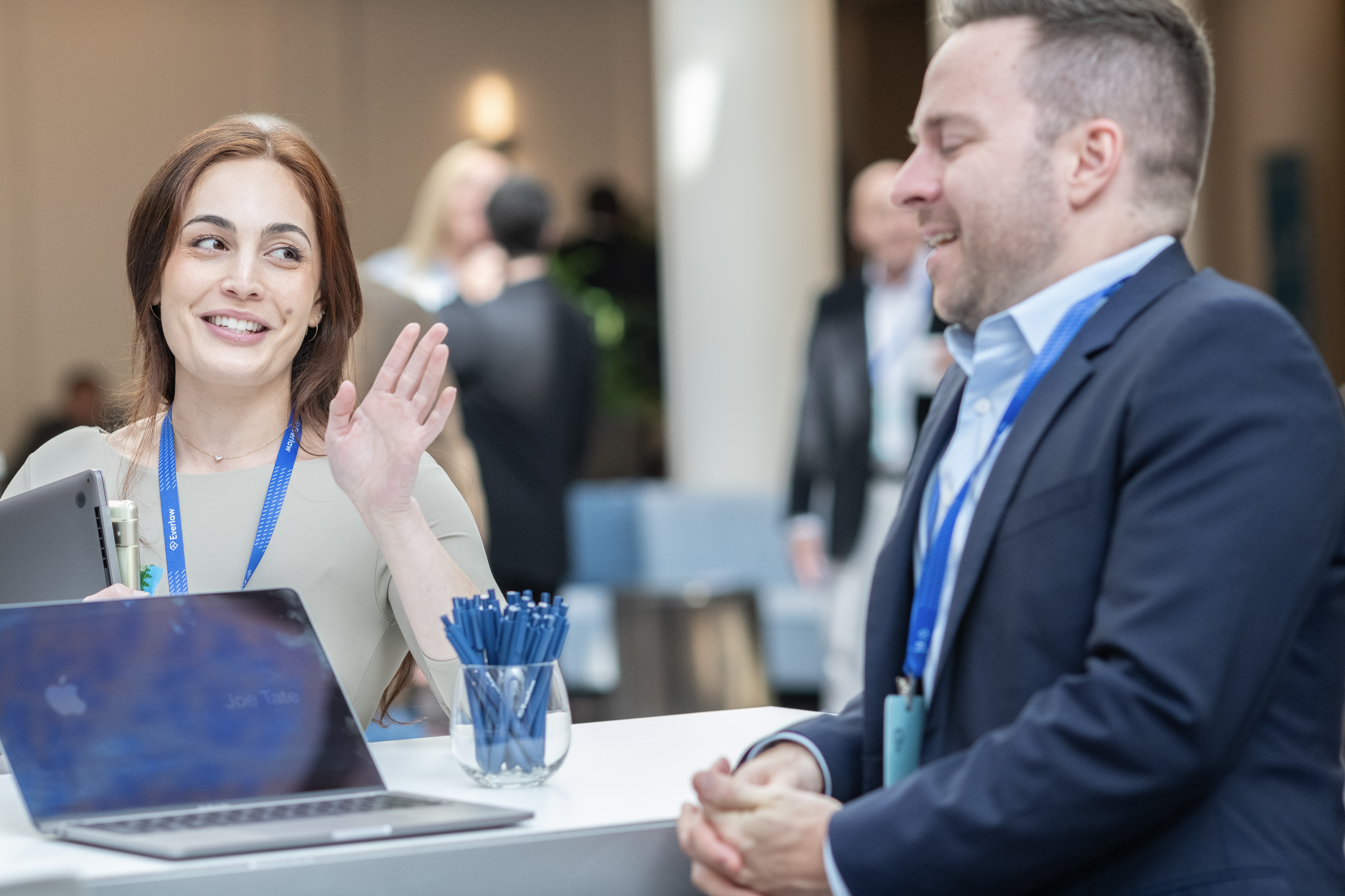 Two Everlaw Summit attendees have a fun, engaging conversation.