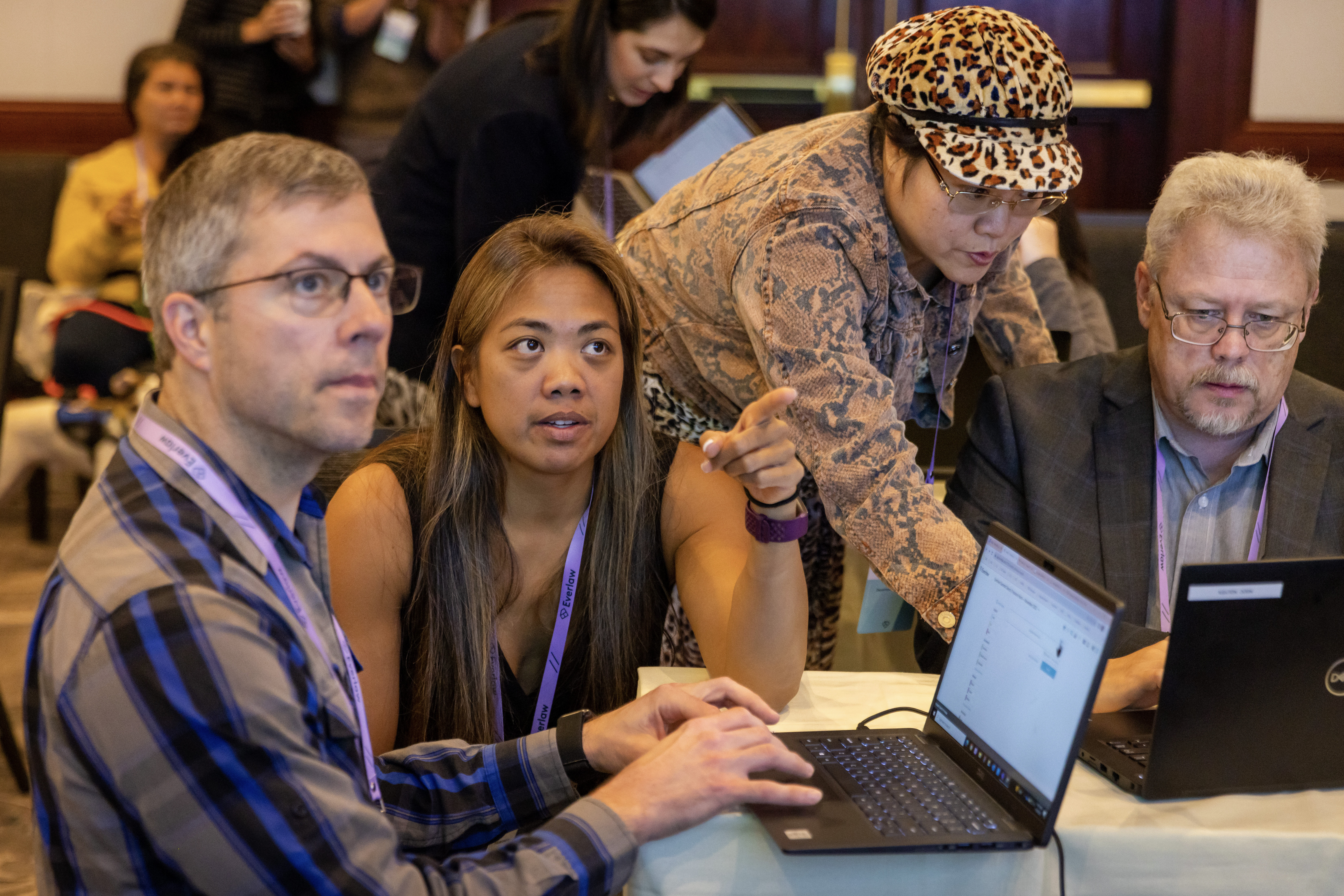 Four Everlaw users participate in interactive training as part of Everlaw Summit