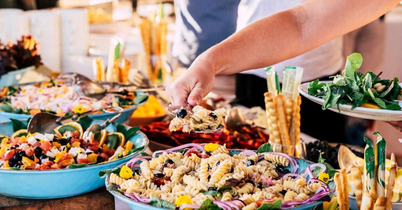 close-up-of-view-of-table-full-of-food-with-someon-2025-03-06-11-26-24-utc