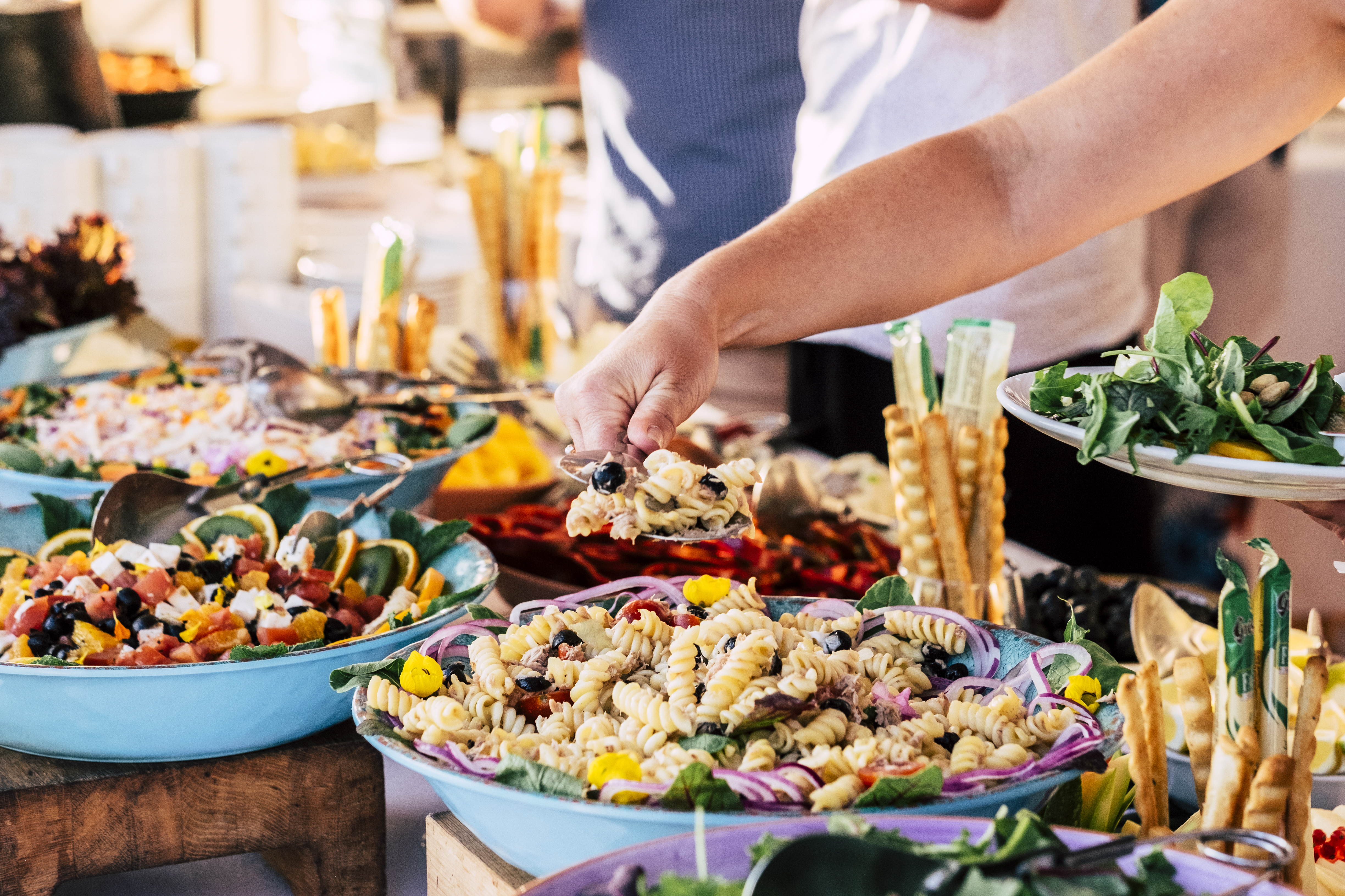 close-up-of-view-of-table-full-of-food-with-someon-2025-03-06-11-26-24-utc