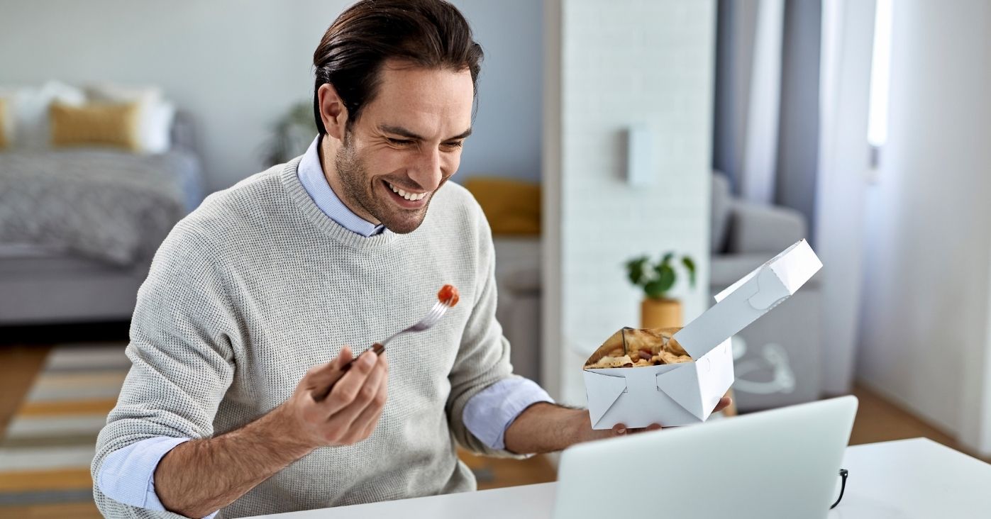 happy-businessman-surfing-the-net-on-laptop-during-2024-12-13-17-08-00-utc