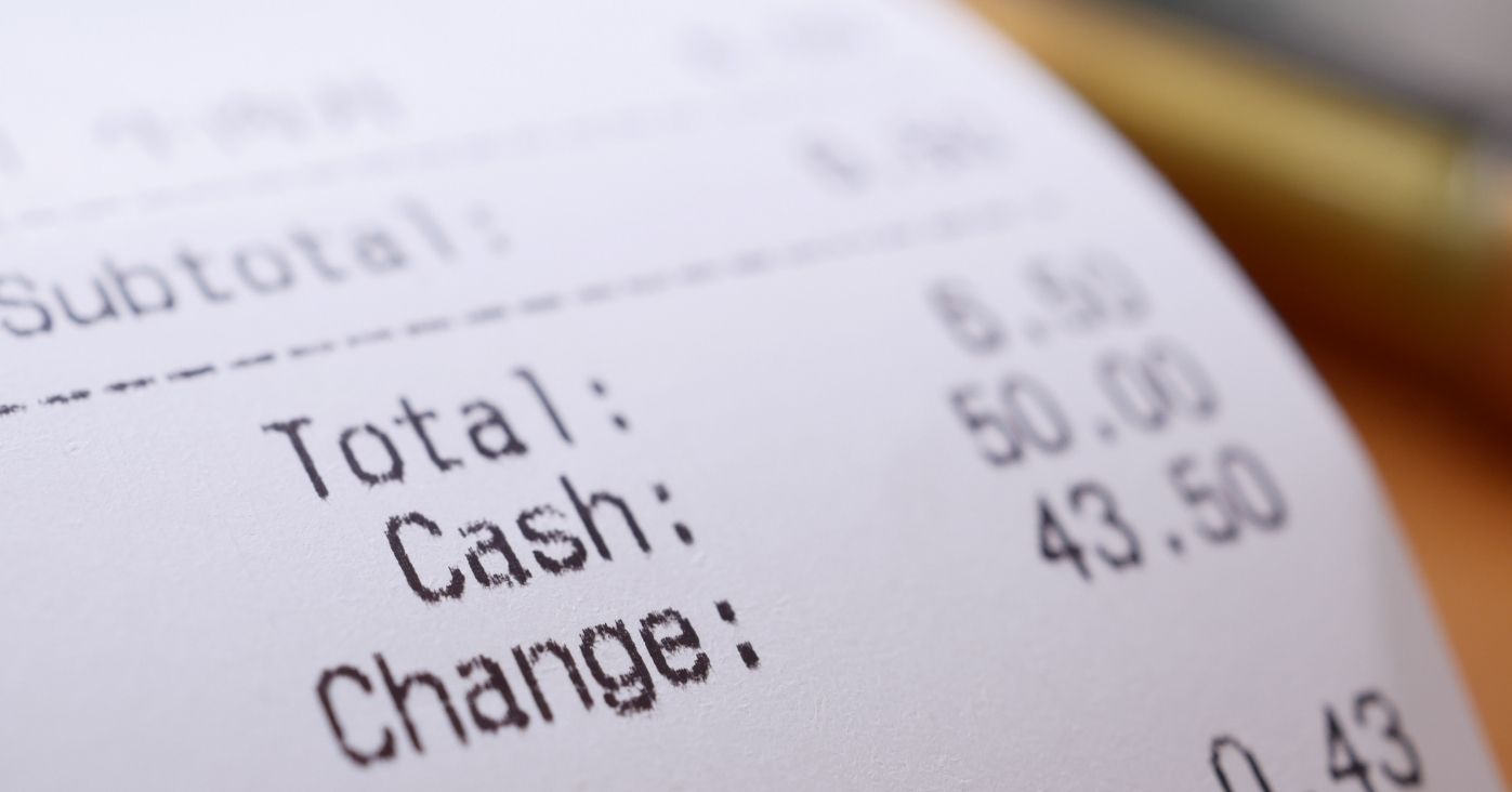 closeup-of-sales-receipts-on-table-2024-12-13-04-38-40-utc