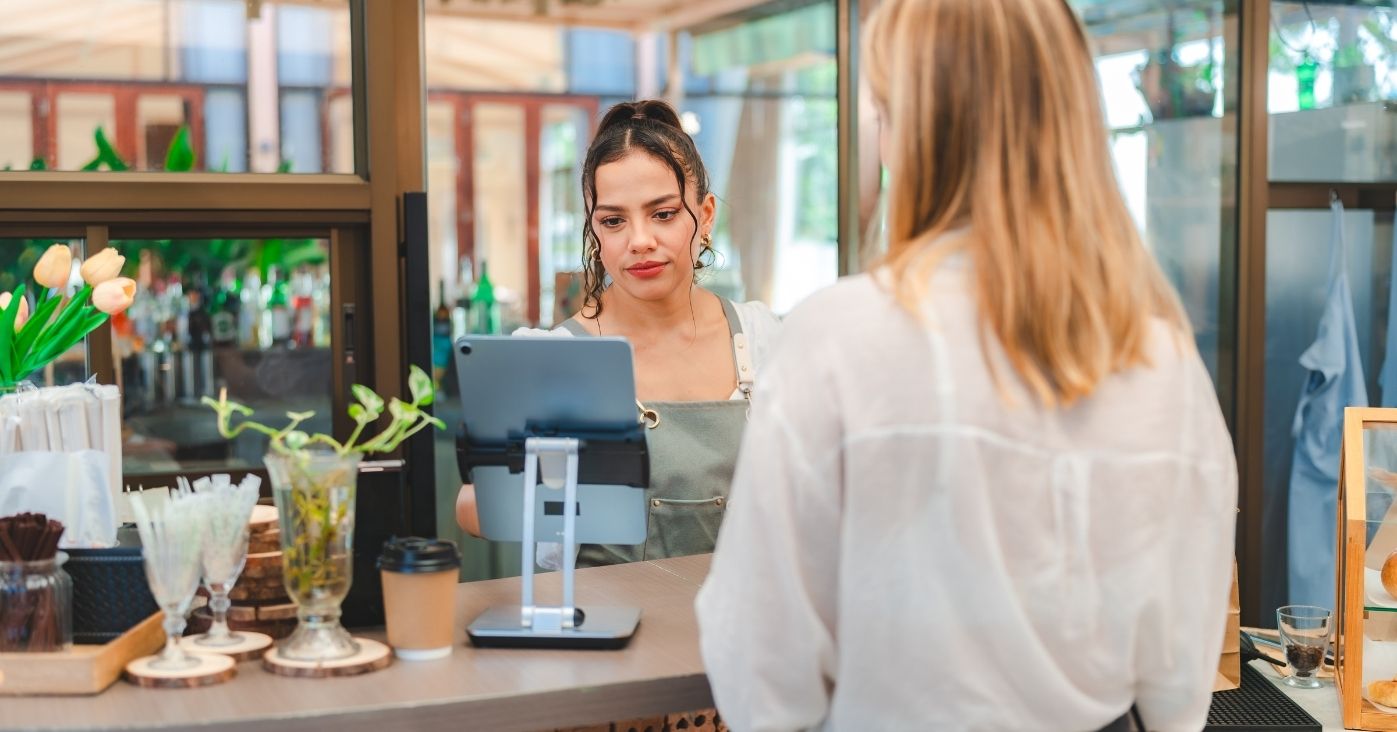 payment-experience-at-cafes-woman-paying-for-her-2025-09-08-23-00-42-utc