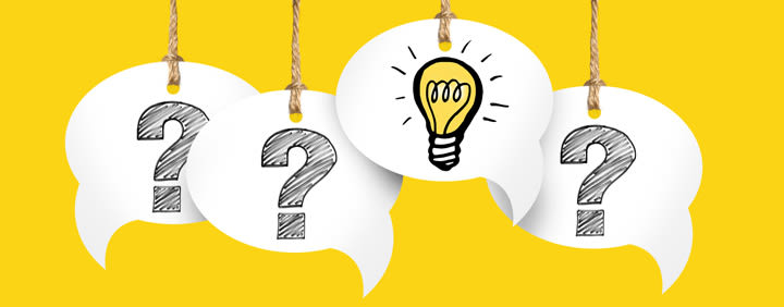 Four white speech bubbles hanging from strings against a yellow background, three with sketched question marks and one with a sketched lightbulb.