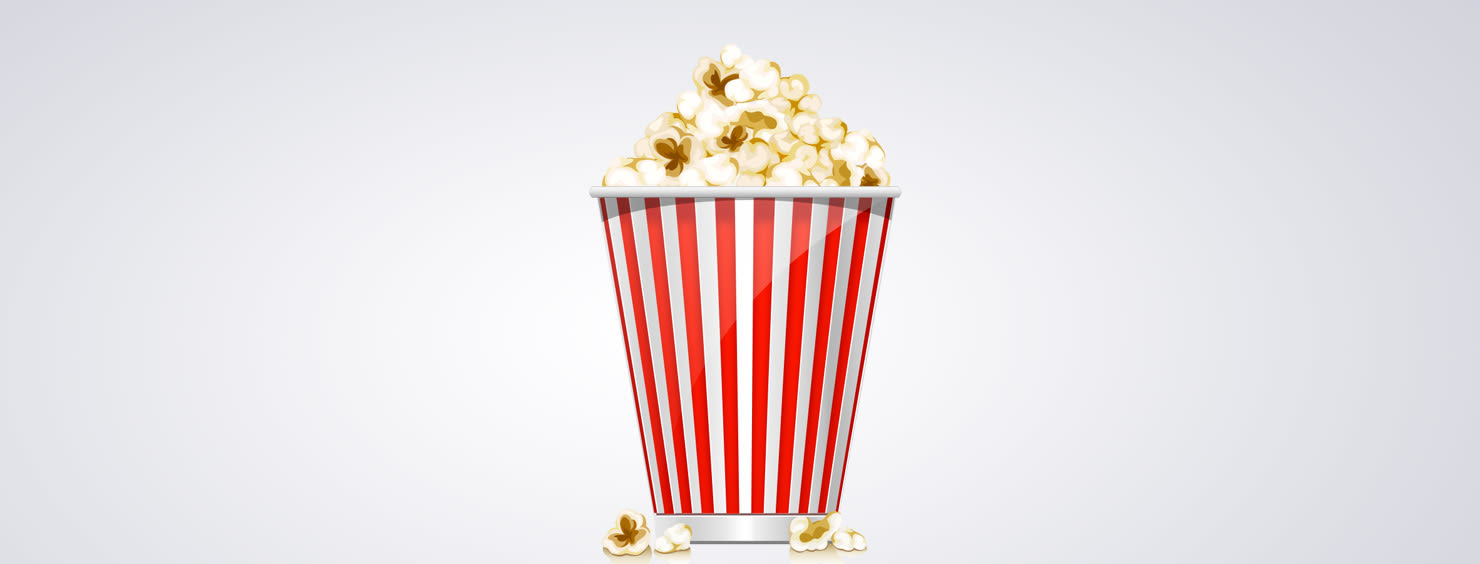 A container full of delicious popcorn, perfect for movie night.