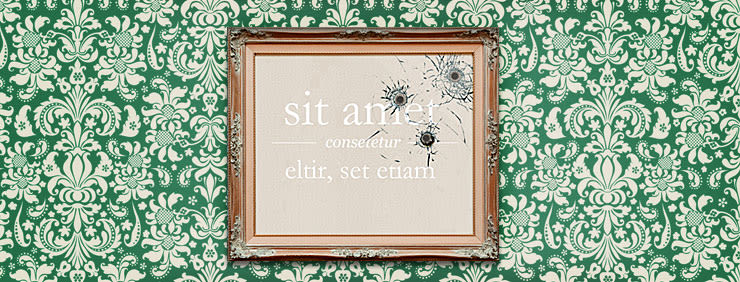 Damaged ornate picture frame with bullet holes against a green and white patterned wallpaper.
