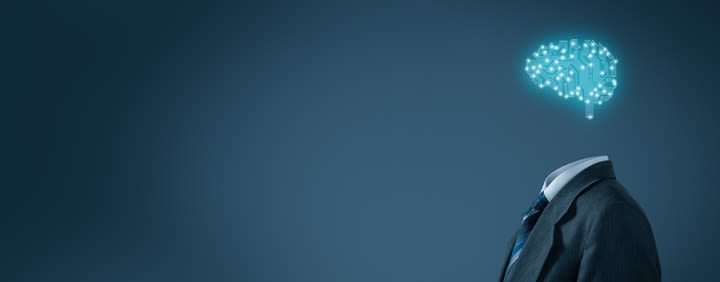 A headless person in a suit with a glowing, circuit board brain hovering above them on a blue background.