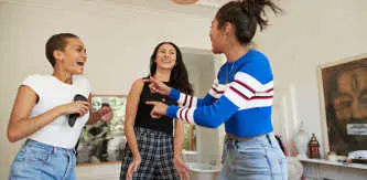 Three laughing teenage girls