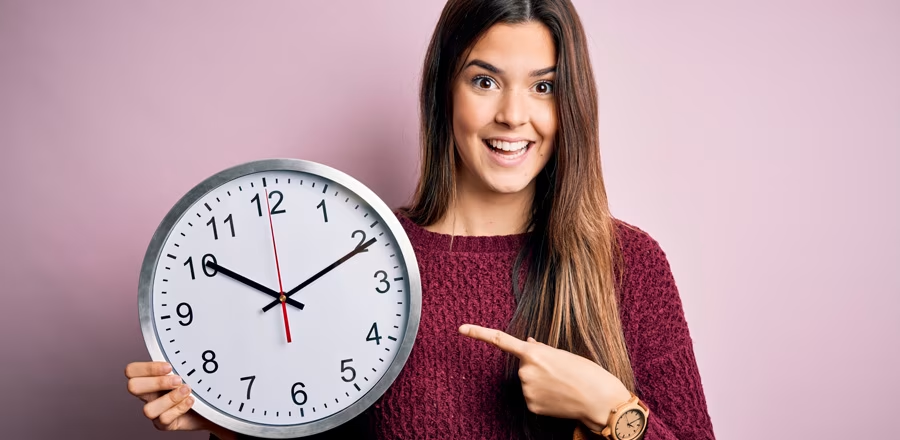 Women holding watch in hand