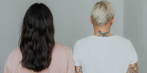 Back-view picture showing the hair of two people