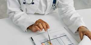 doctor with a pen and clipboard