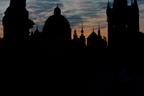 Silhouettes from Charles Bridge at sunrise, Prague